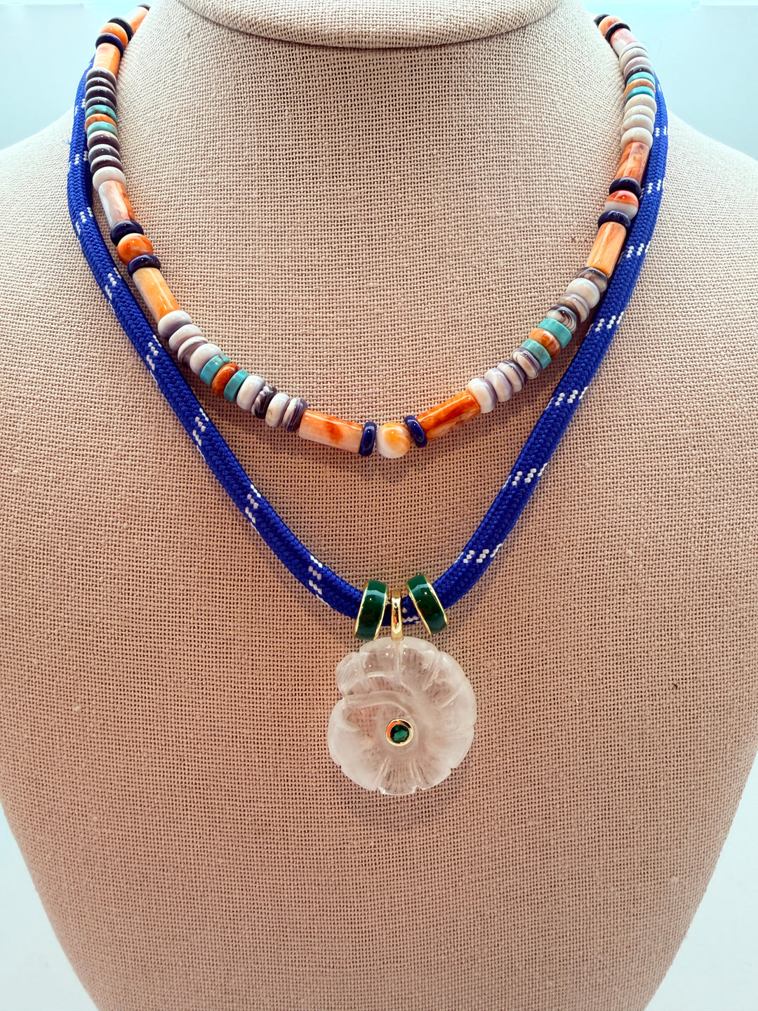 Clear Quartz Spiral Shell on Blue Cord Necklace
