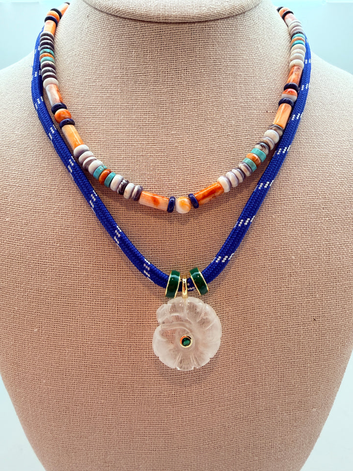 Clear Quartz Spiral Shell on Blue Cord Necklace
