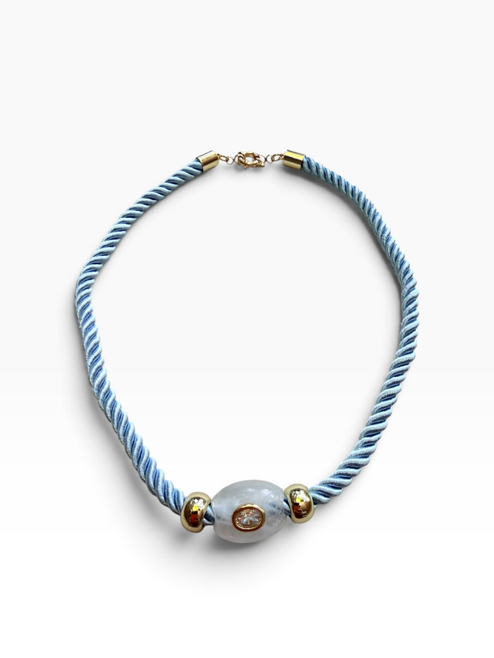 White Quartz Oval on Light Blue Cord Necklace