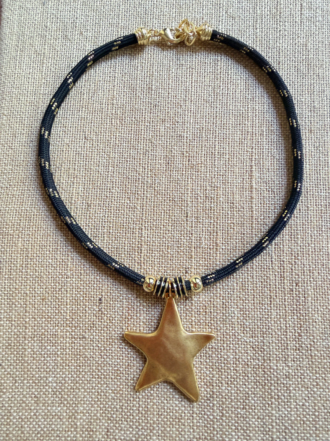 Gold Star Pendant on Black and Gold Cord Necklace